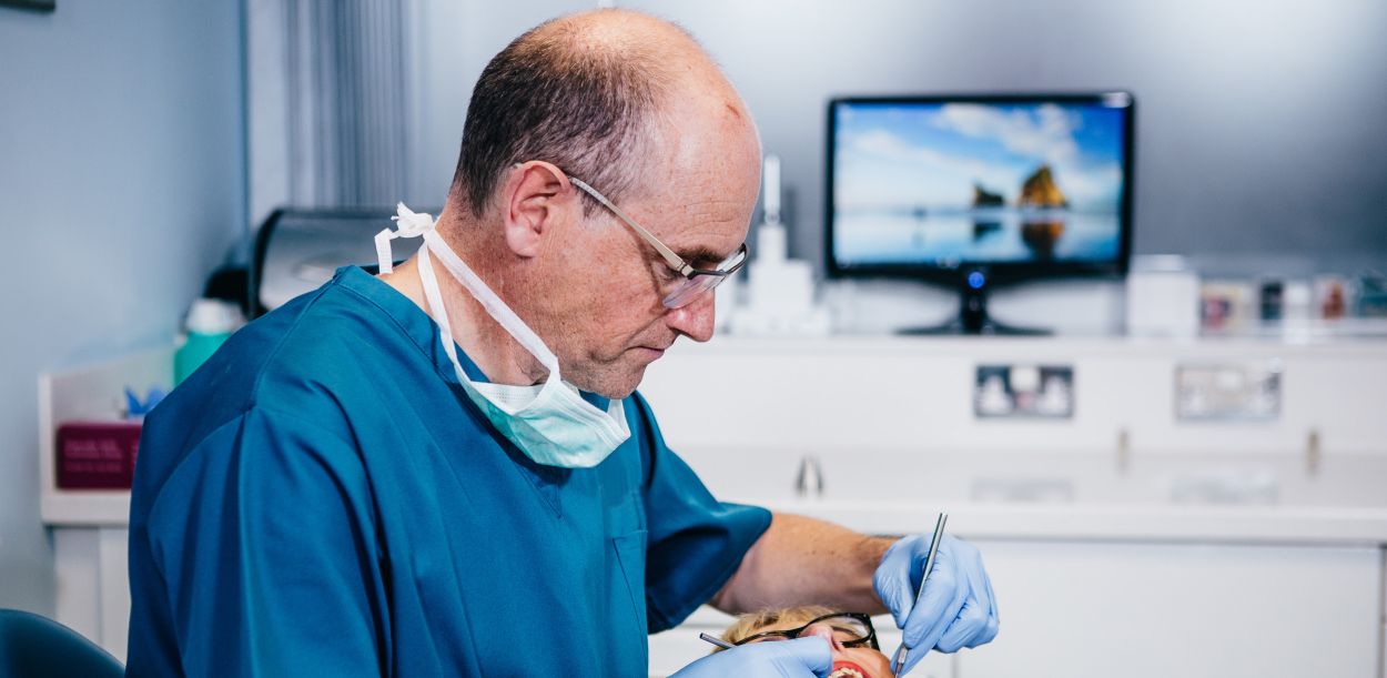 dentist with patient